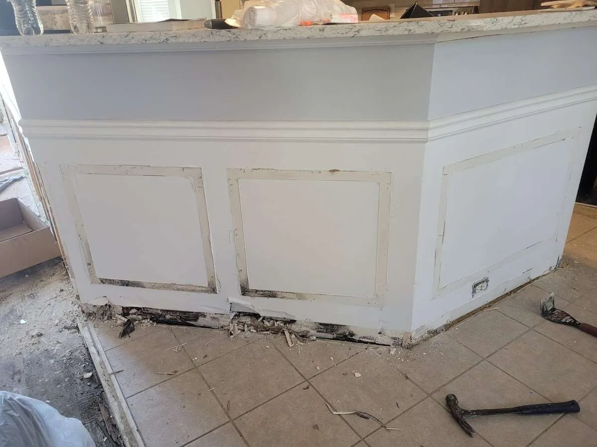 Water damage and mold on kitchen during Storm Damage Restoration in Wesley Hills